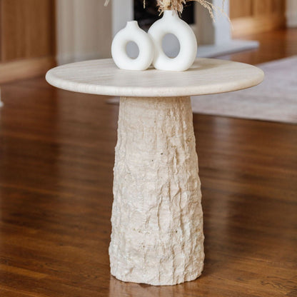 Custom raw travertine pedestal and dining room table